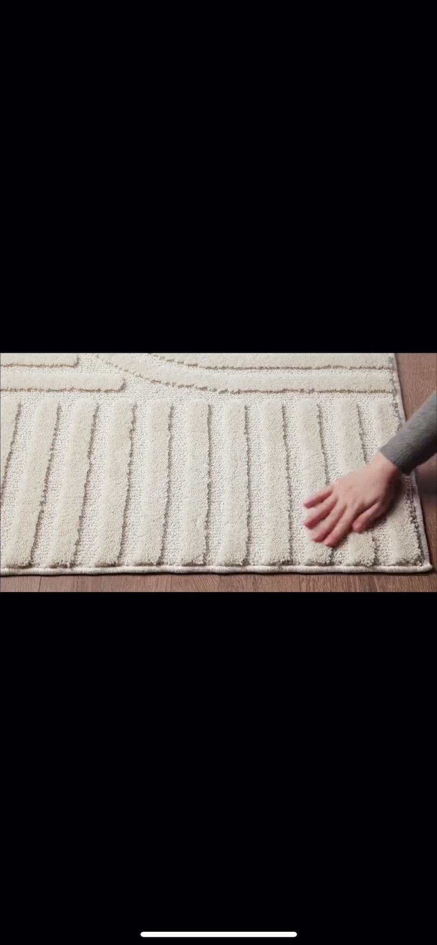 Tapis crème à motifs minimaliste en relief